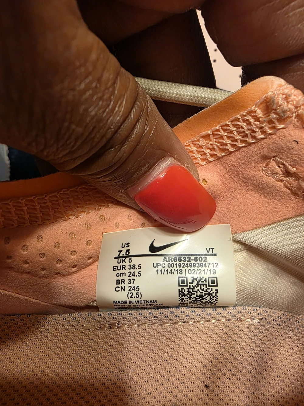 Nike Women’s VaporMax Sneakers in Coral and Yellow Accent